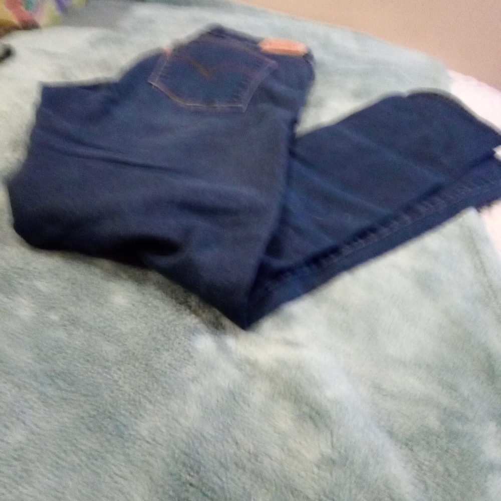 105) Levi's Strauss Co women's red tag jeans